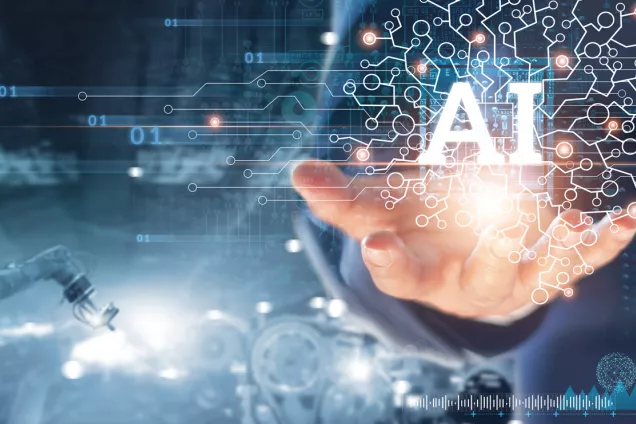 bild. En hand med texten ''AI'' och en robothand i bakgrunden. 