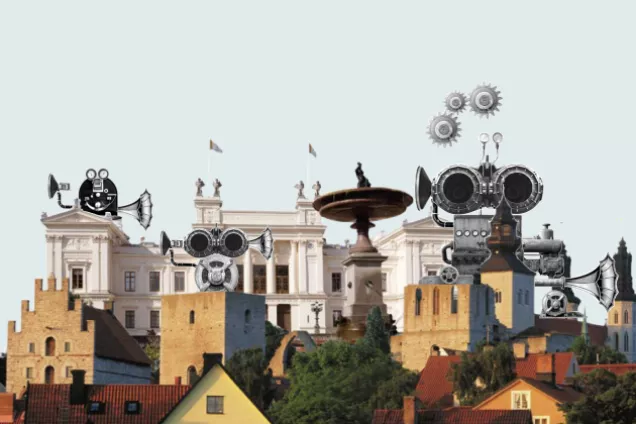 Illlustration: Robotar och byggnader i Visby.